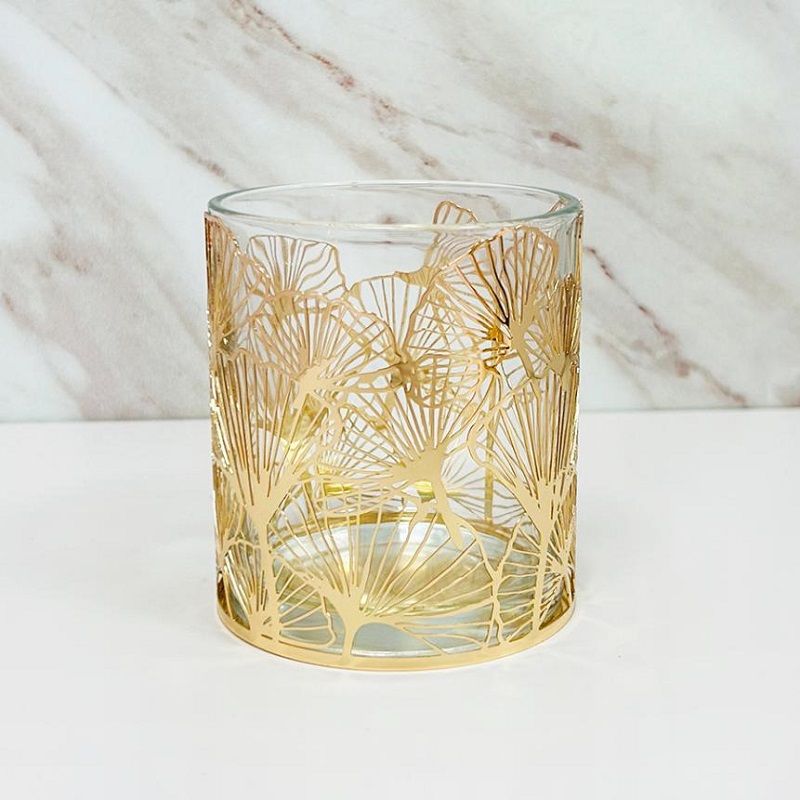 Candlestick kaca ginkgo yang elegan telah melancarkan, menerangi dunia baru estetika rumah.